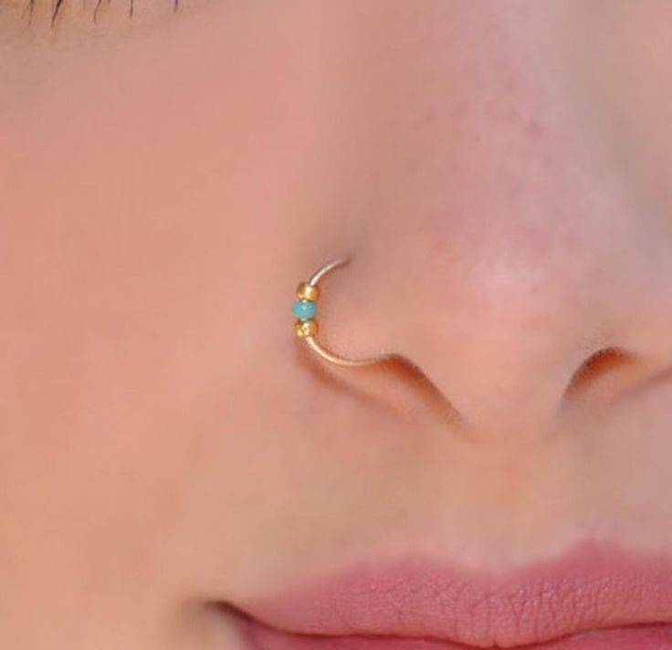 Что означает пирсинг в носу у девушки или мужчины: значение стороны прокола